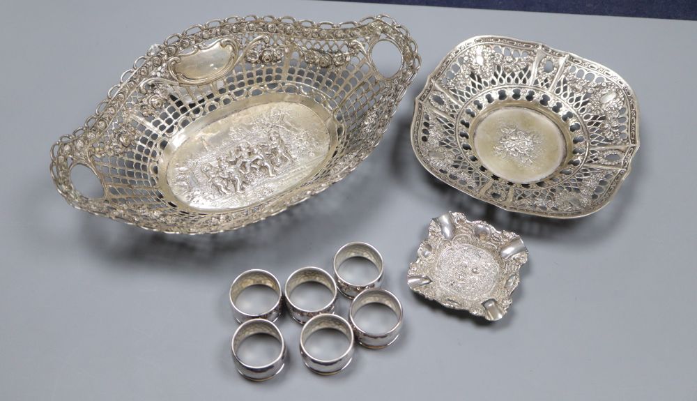 Three assorted white metal dishes, two German stamped 800 and a set of six small 835 napkin rings? gross 11oz.